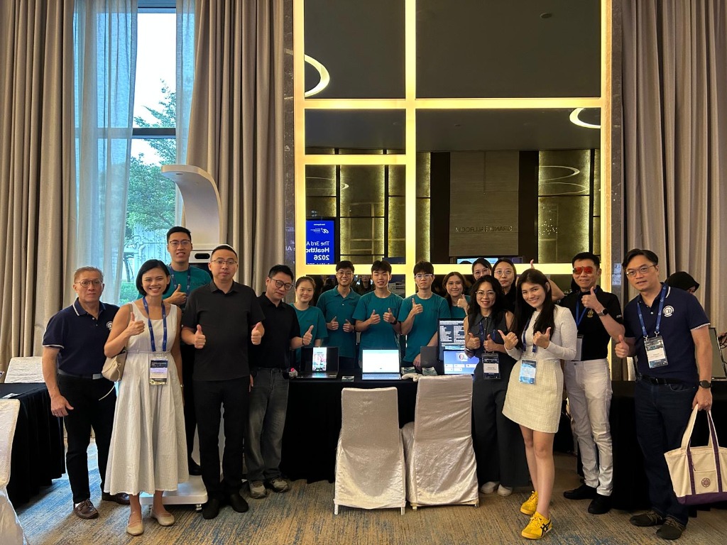 Justin Yu with Senior Minister of State Tan Kiat How, the Face AI team, and collaborators at the Healthcare AI Symposium 2026