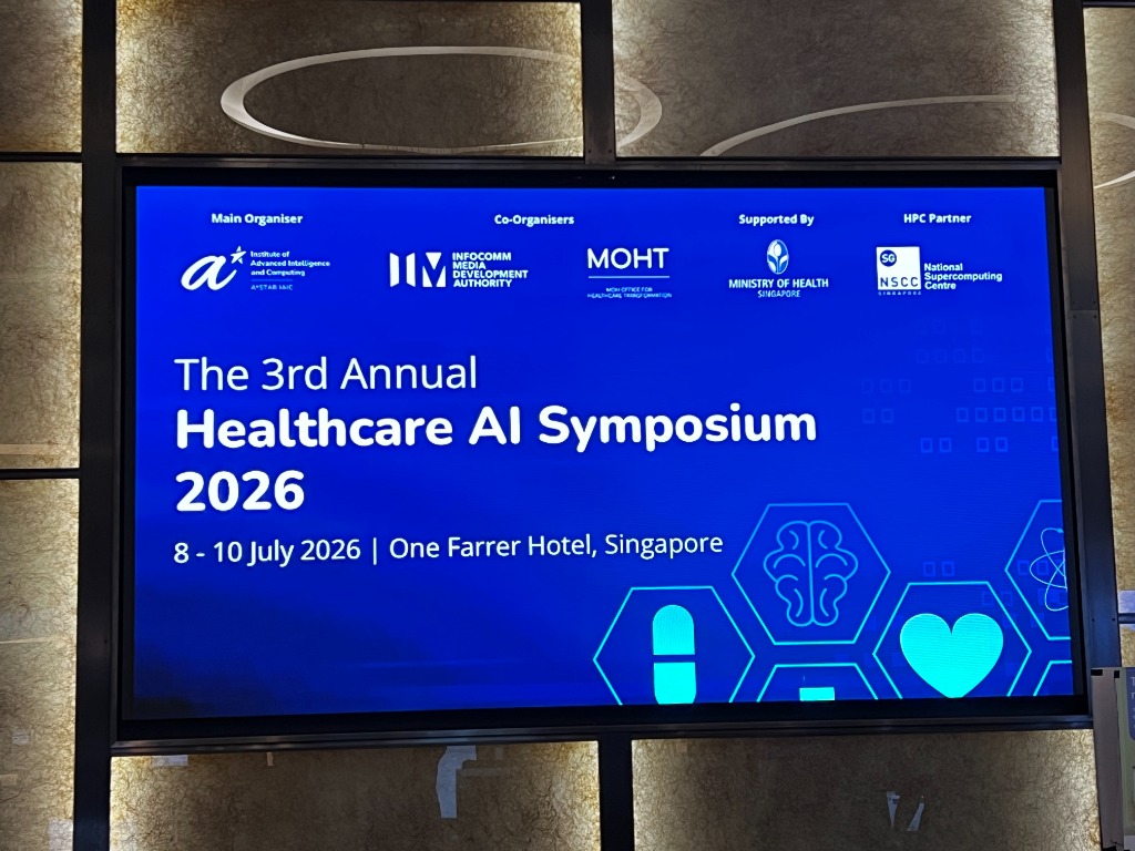 The 3rd Annual Healthcare AI Symposium 2026 digital stage display at One Farrer Hotel.